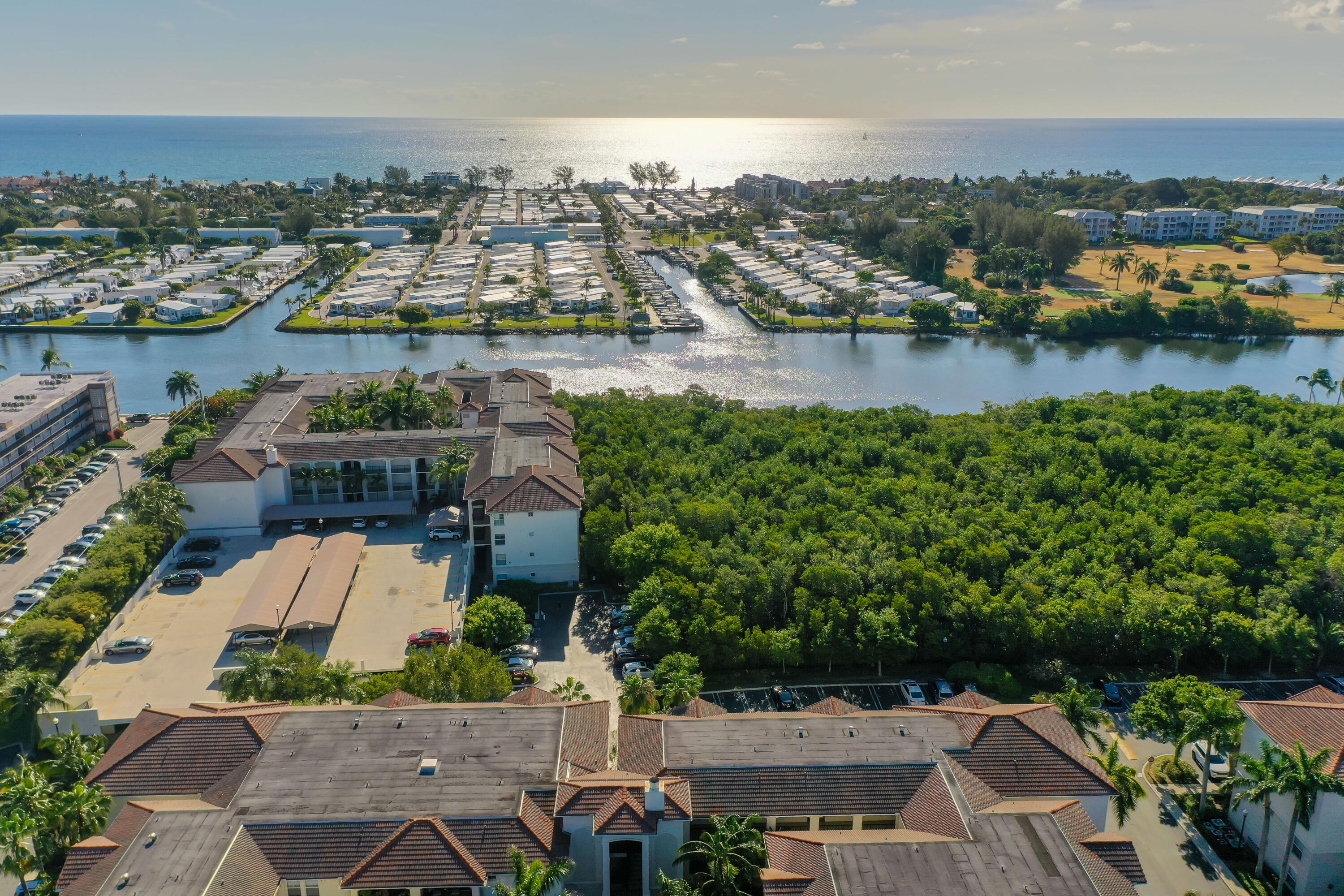 3115 Tuscany Way Boynton Beach, FL 33435 - Photo 4 of 49 an aerial view of a city with lots of residential buildings lake and ocean view