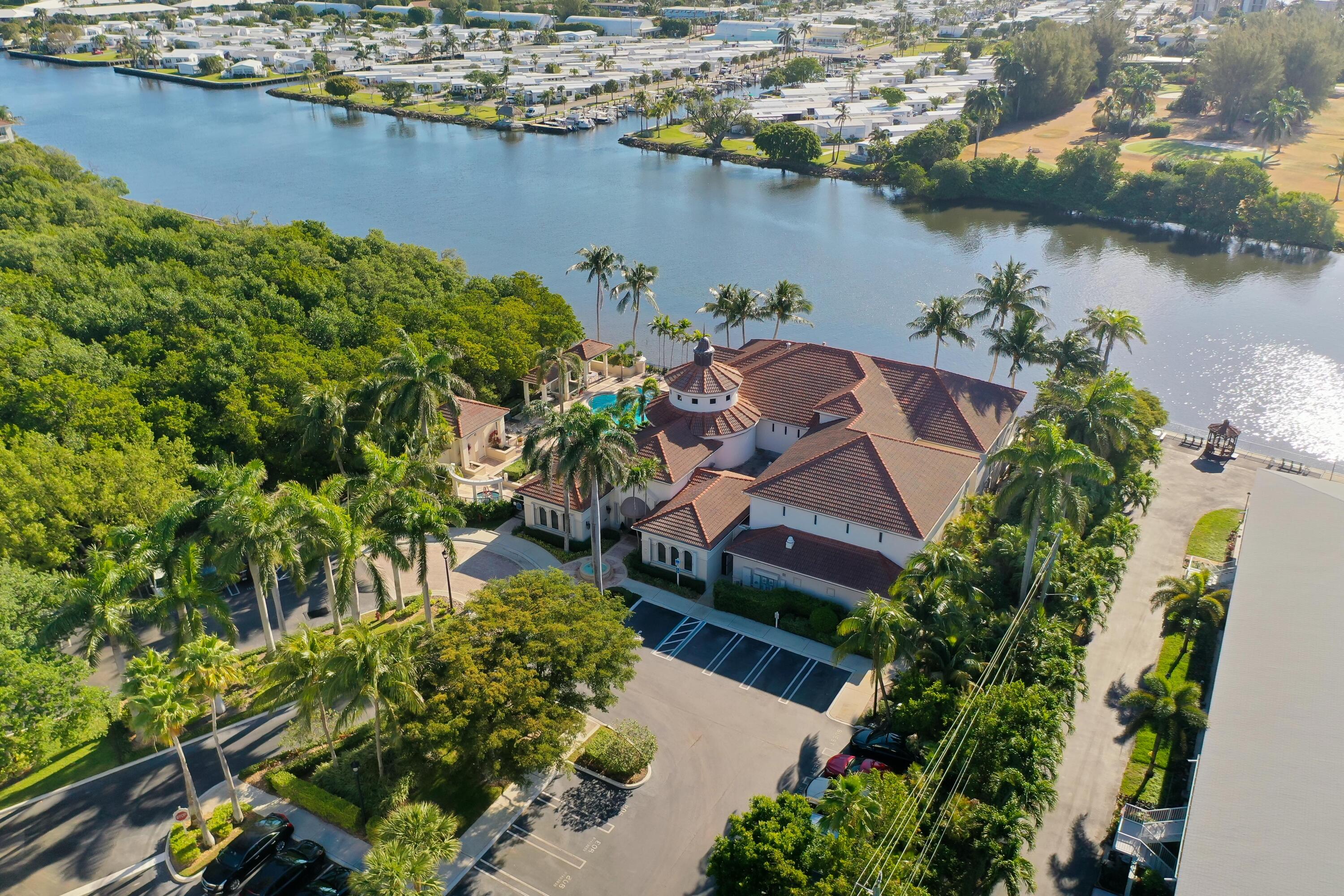 3115 Tuscany Way Boynton Beach, FL 33435 - Photo 8 of 49 an aerial view of a house with a lake view