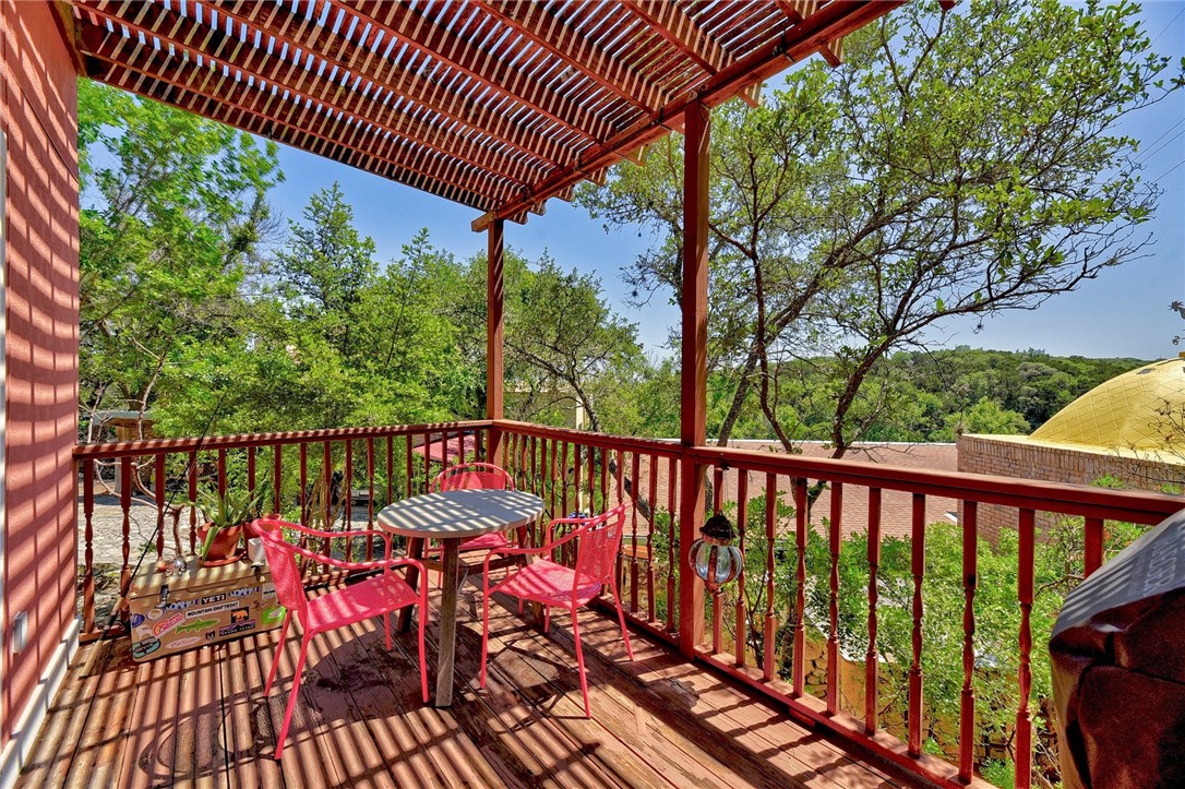 1712 Lakeshore Drive, Unit A Austin, TX 78746 - Photo 4 of 15 a view of a balcony with wooden floor