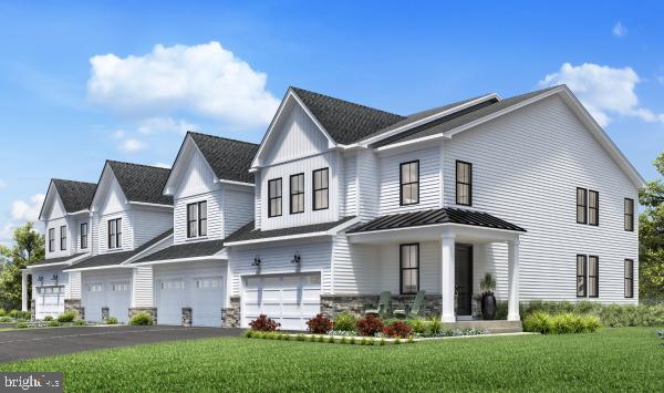 2 Cherry Lane West Windsor, NJ 08550 - Photo 2 of 12 a front view of a house with a garden and plants