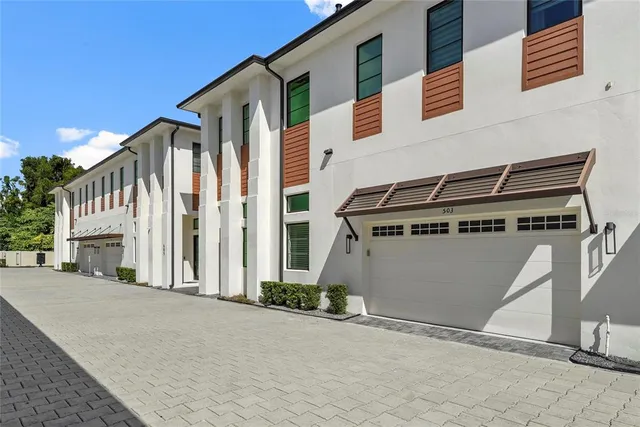 a view of a house with a house and stairs