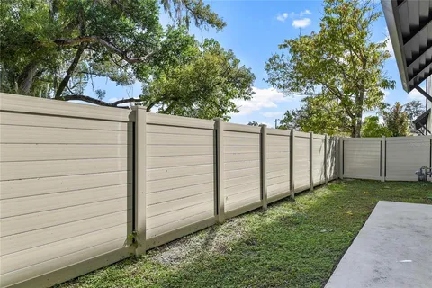 a view of a back yard of the house