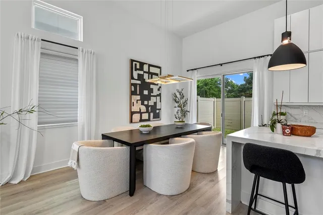 a room with a table and chairs