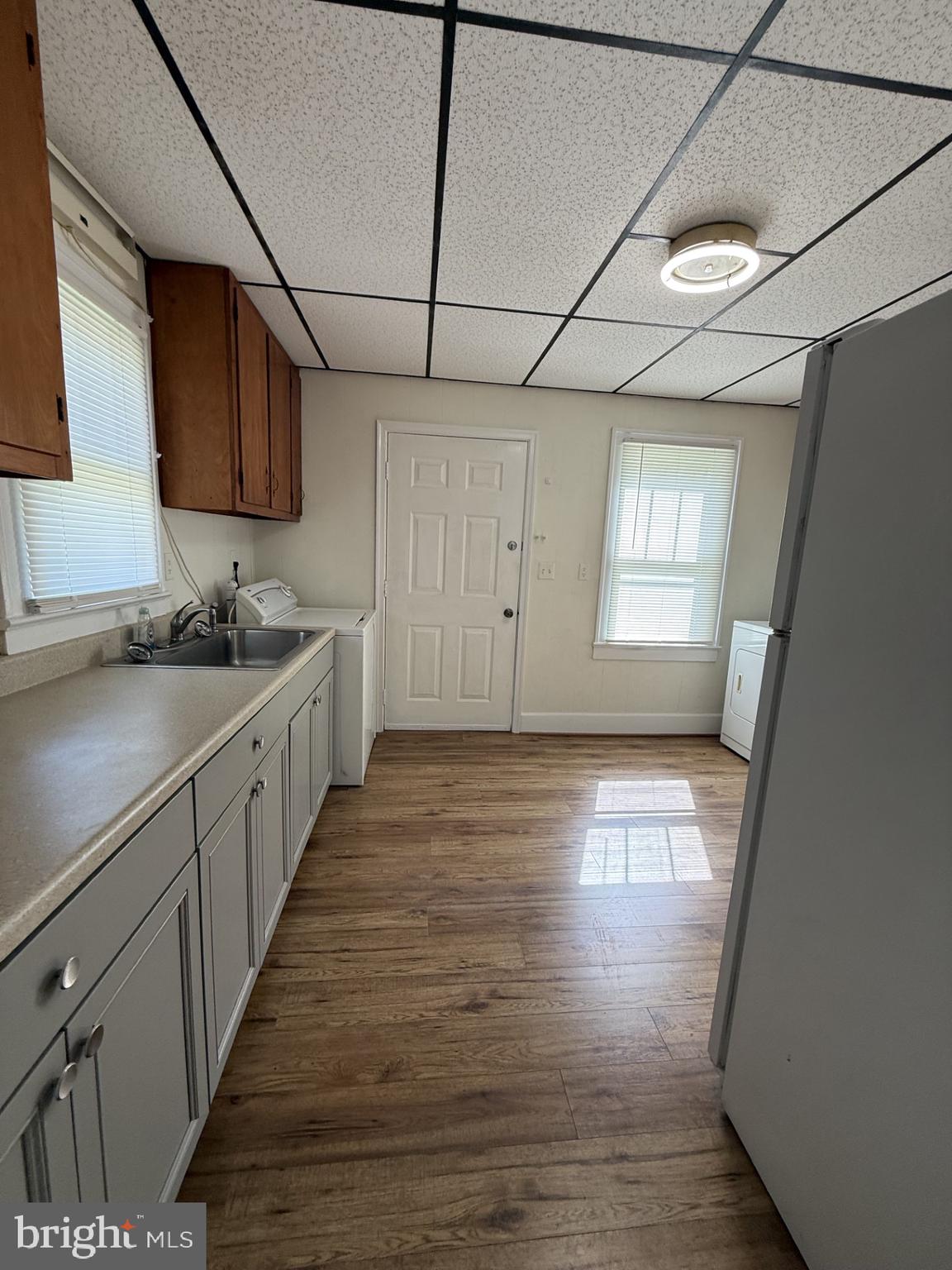 5497 Rosedale Drive King George, VA 22485 - Photo 4 of 12 a kitchen with sink and cabinets