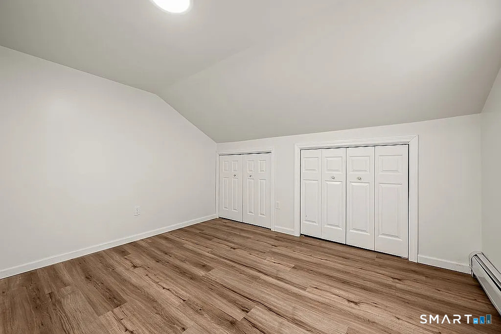 78 Union Street Bristol, CT 06010 - Photo 18 of 27 a view of a room with wooden floor