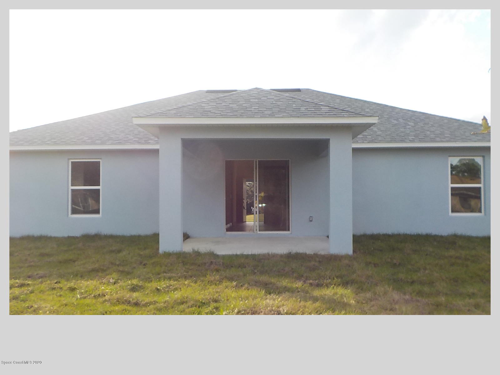 6795 Haddington Road Cocoa, FL 32927 - Photo 17 of 18 a view of small yard