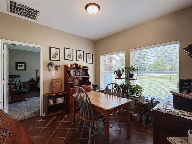 a view of a livingroom with furniture