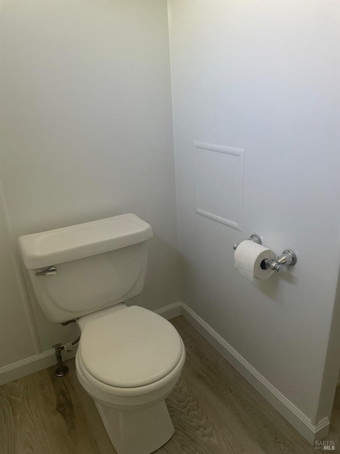 94 Buckwood Place Santa Rosa, CA 95409 - Photo 18 of 25 a white toilet sitting next to a white sink