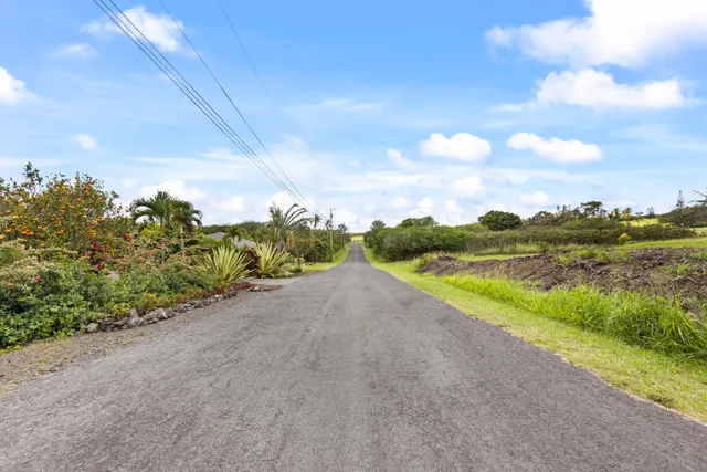a view of an ocean and a yard