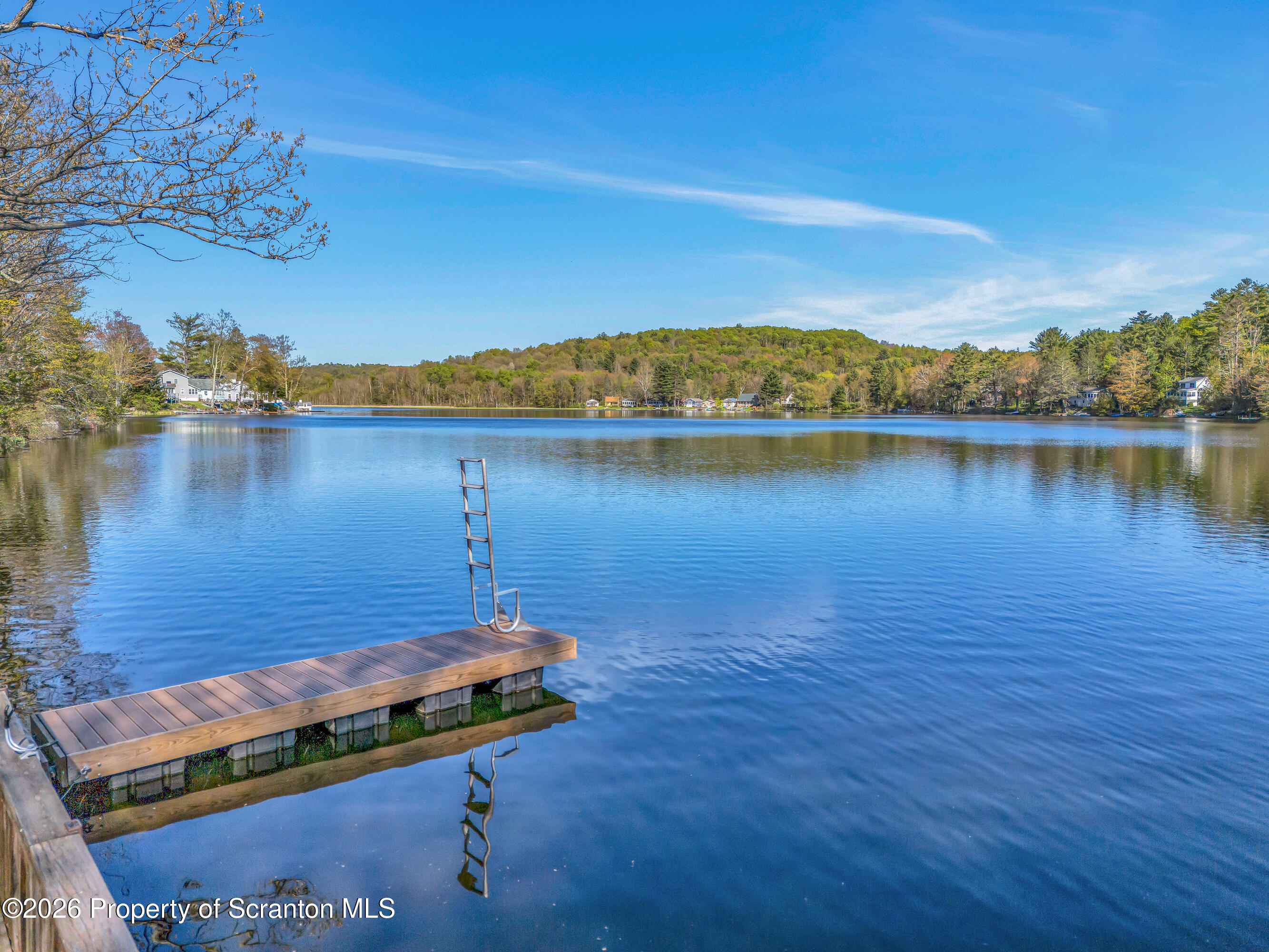 155 Baylor Road Nicholson, PA 18446 - Photo 3 of 53 a view of a lake with a mountain