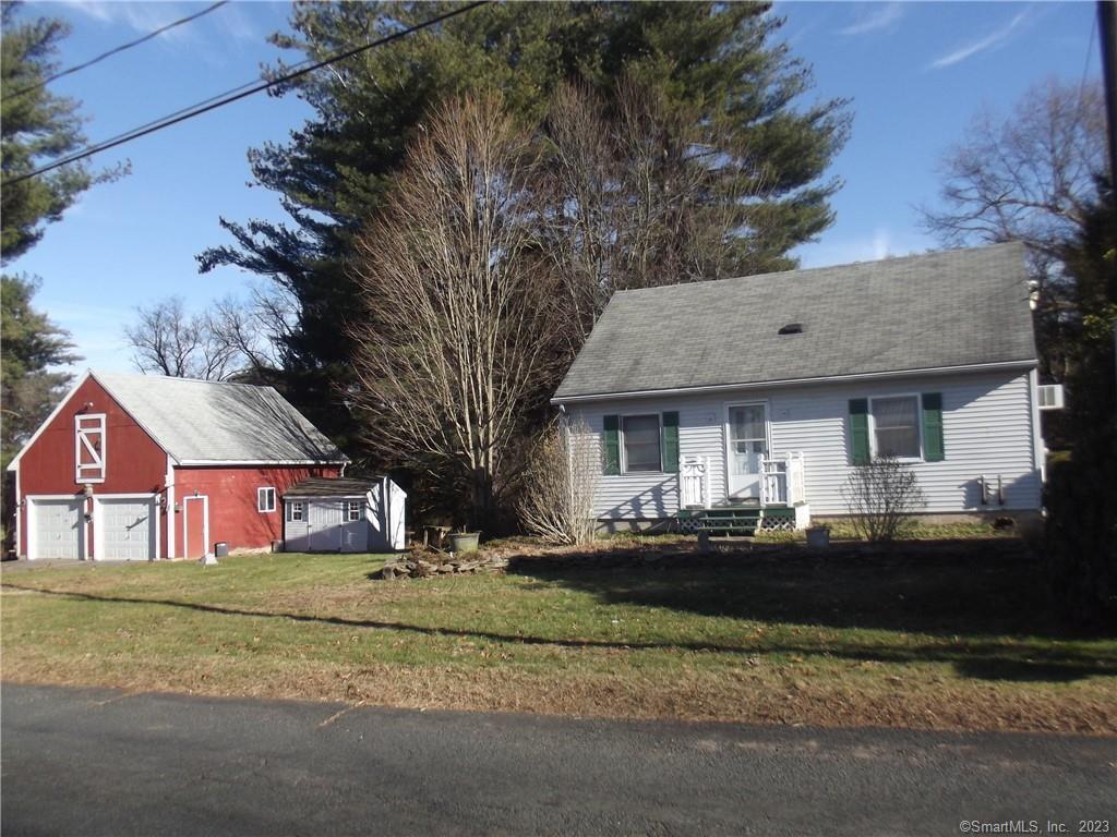 a front view of house with yard