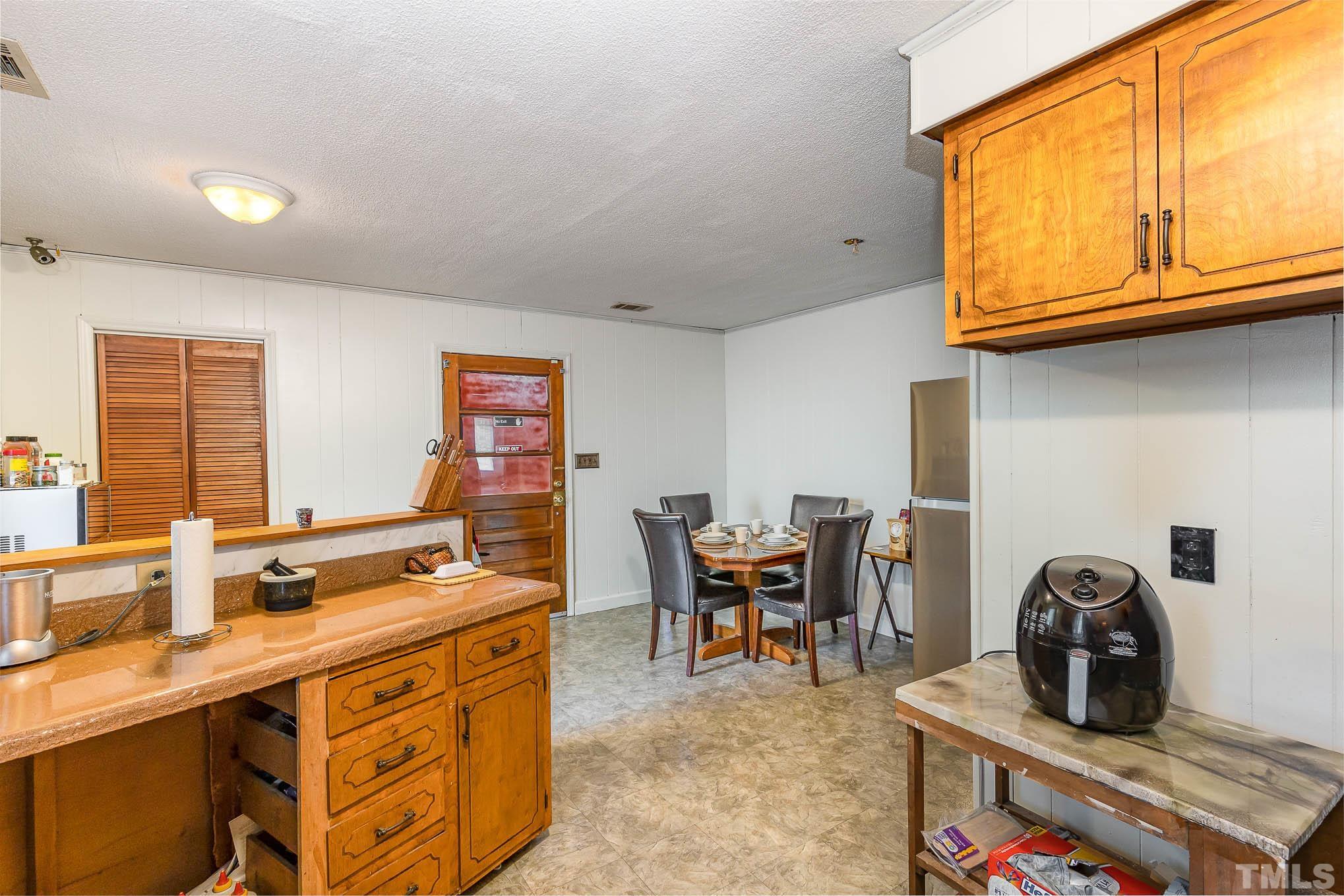 435 Temple Road Bunnlevel, NC 28323 - Photo 13 of 32 a room with furniture a flat screen tv and a window