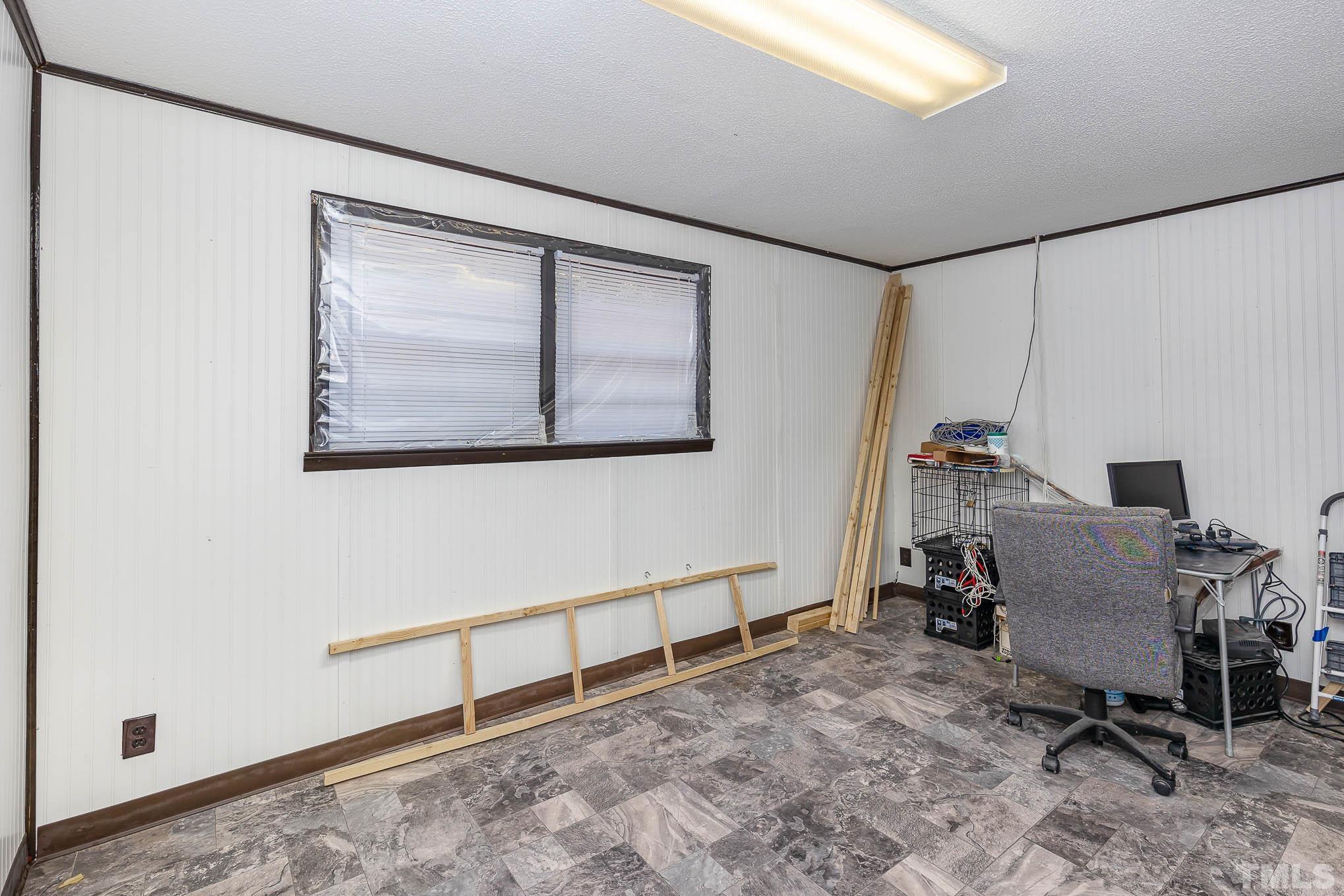 435 Temple Road Bunnlevel, NC 28323 - Photo 20 of 32 a view of workspace with window