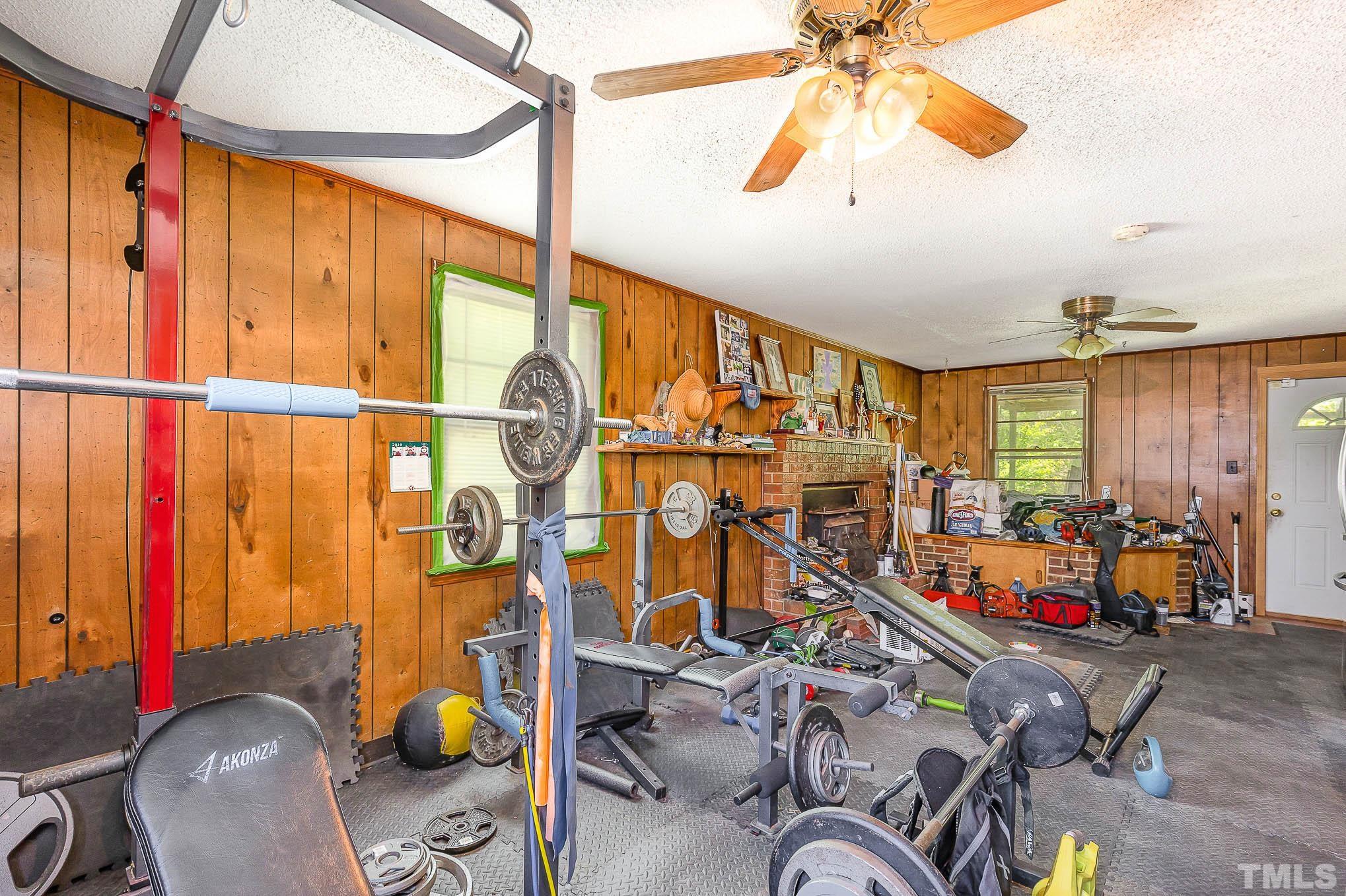 435 Temple Road Bunnlevel, NC 28323 - Photo 24 of 32 a view of a room with gym equipment