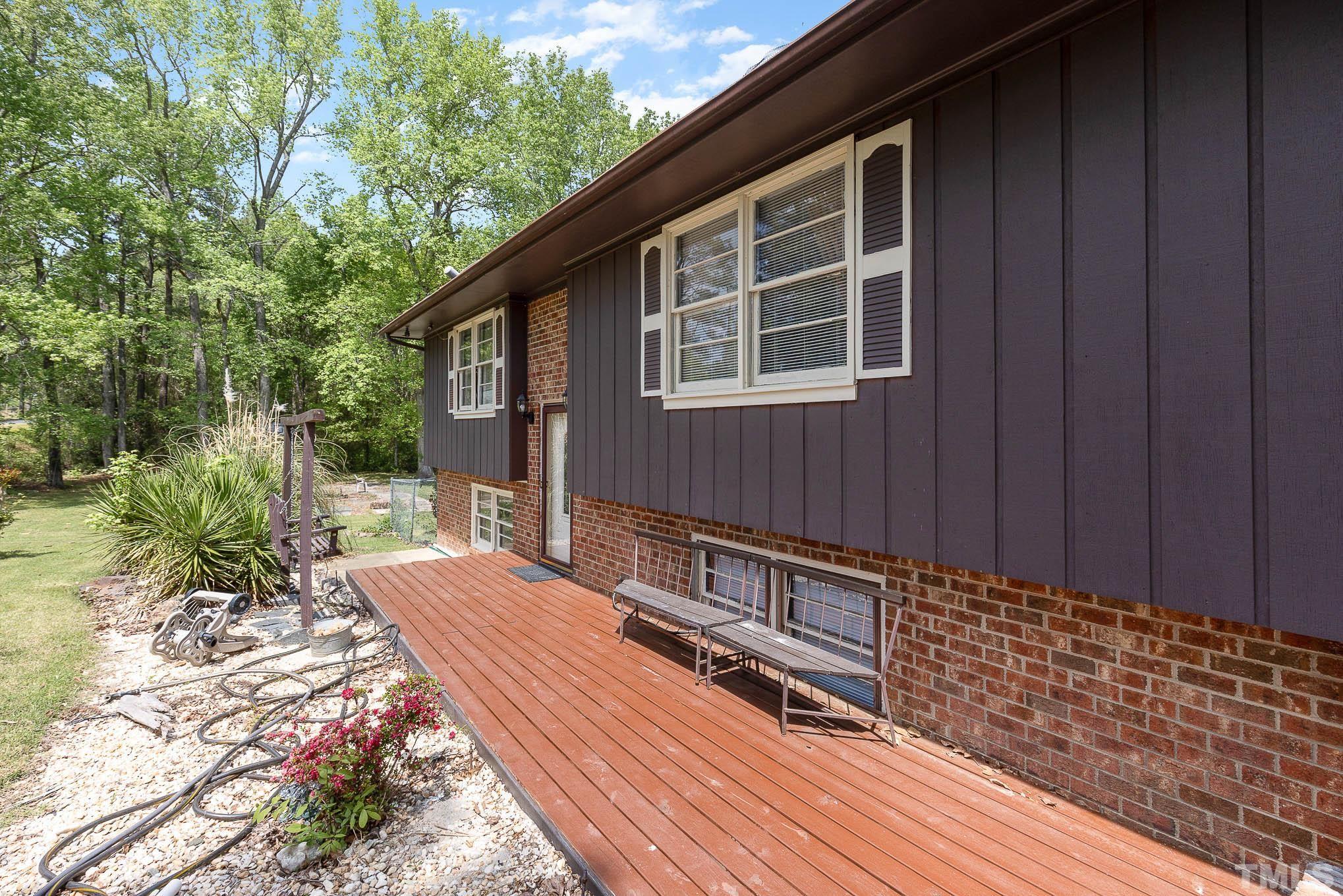 435 Temple Road Bunnlevel, NC 28323 - Photo 26 of 32 a backyard of a house with seating space