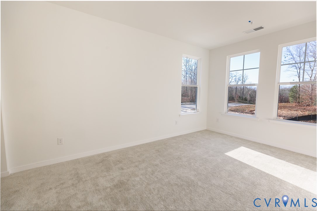4116 Ebbies Crossing Midlothian, VA 23112 - Photo 11 of 42 an empty room with windows