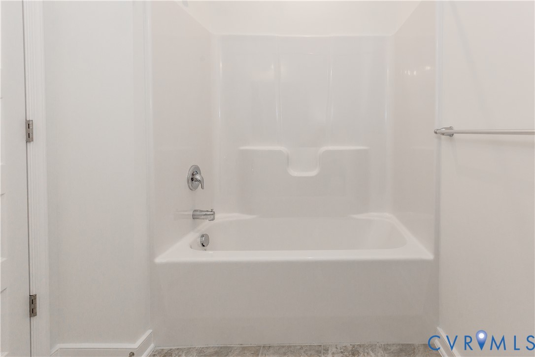 4116 Ebbies Crossing Midlothian, VA 23112 - Photo 20 of 42 a white bath tub sitting next to a white sink and vanity