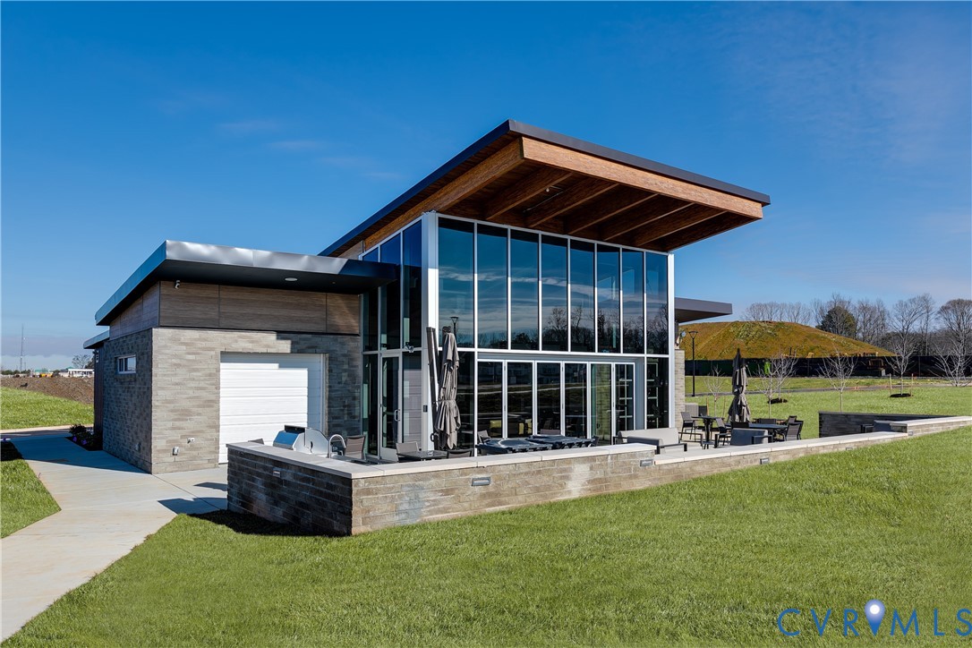 4116 Ebbies Crossing Midlothian, VA 23112 - Photo 27 of 42 a front view of a house with a yard