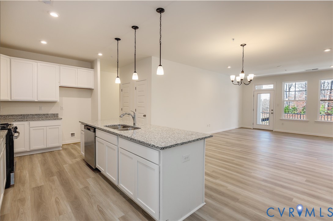 4116 Ebbies Crossing Midlothian, VA 23112 - Photo 4 of 42 a kitchen with a sink and stove top oven