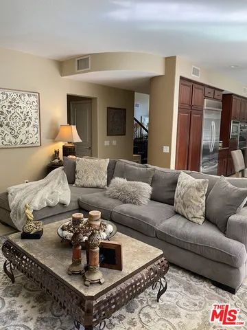 a bedroom with a bed furniture and a window