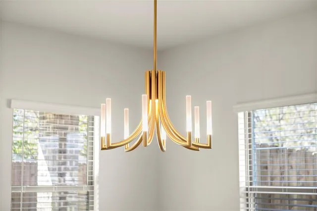 a kitchen with sink cabinets and wooden floor