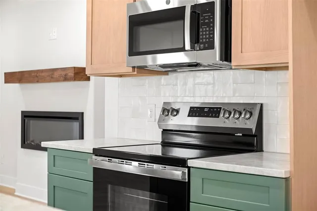 a bathroom with a sink and a large mirror