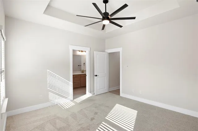 a bathroom with a double vanity sink and mirror