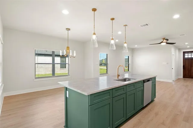 a view of an empty room with a fireplace