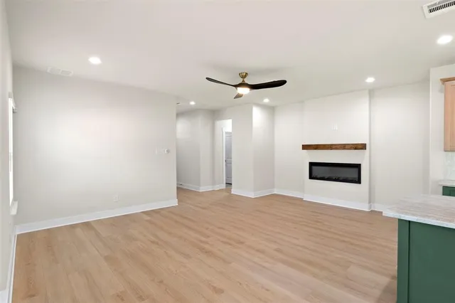 a view of kitchen with a sink and a stove