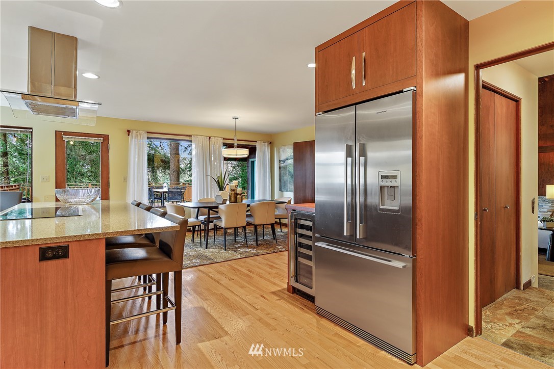 8316 Olympic View Drive Edmonds, WA 98026 - Photo 12 of 38 a very nice looking living room with a large window and stainless steel appliances