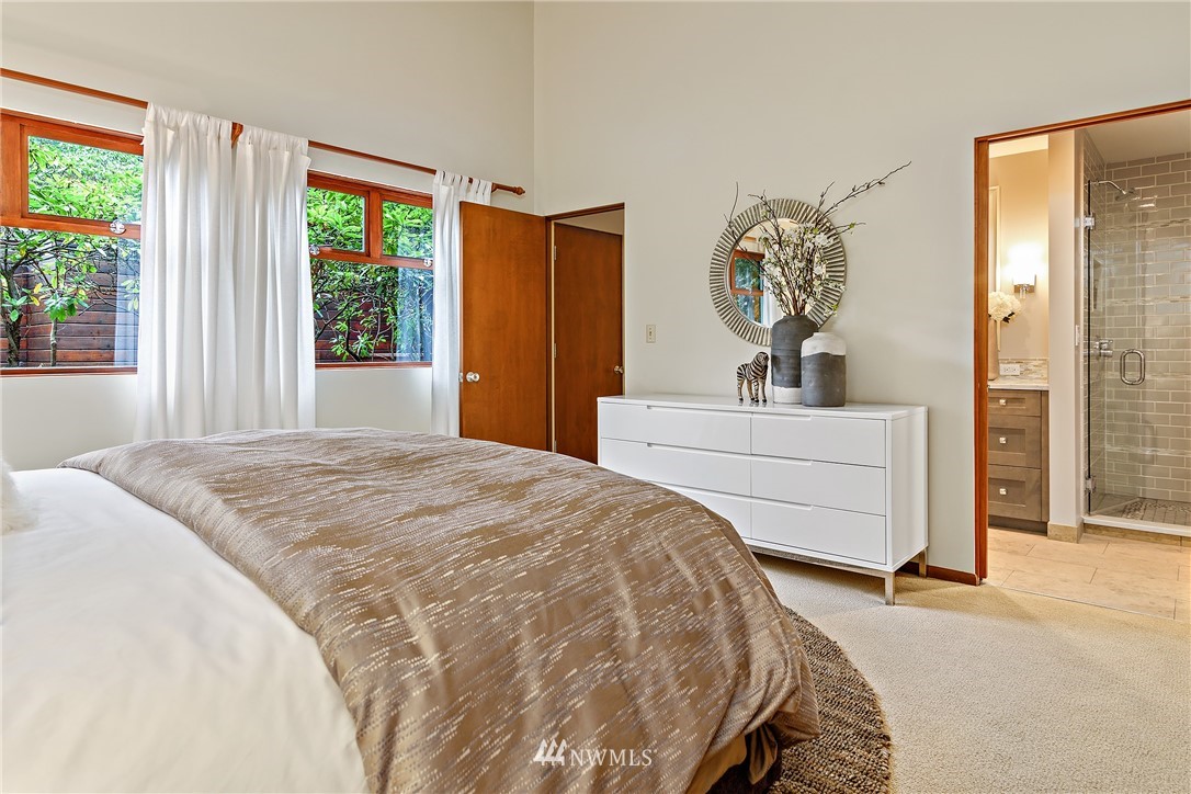 8316 Olympic View Drive Edmonds, WA 98026 - Photo 17 of 38 a bedroom with a bed and a window