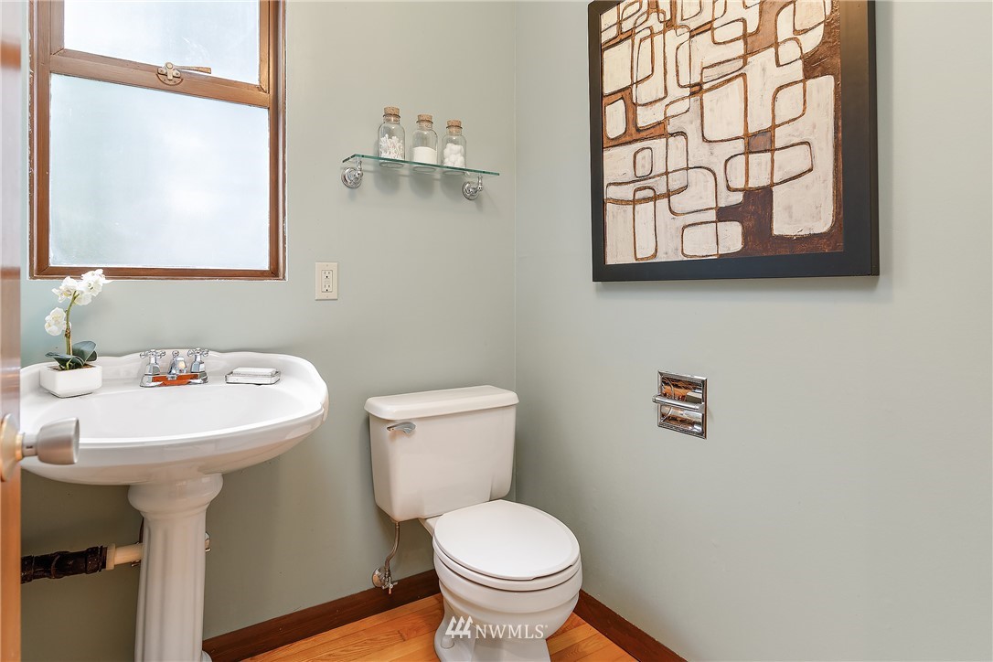 8316 Olympic View Drive Edmonds, WA 98026 - Photo 24 of 38 a bathroom with a sink toilet and mirror