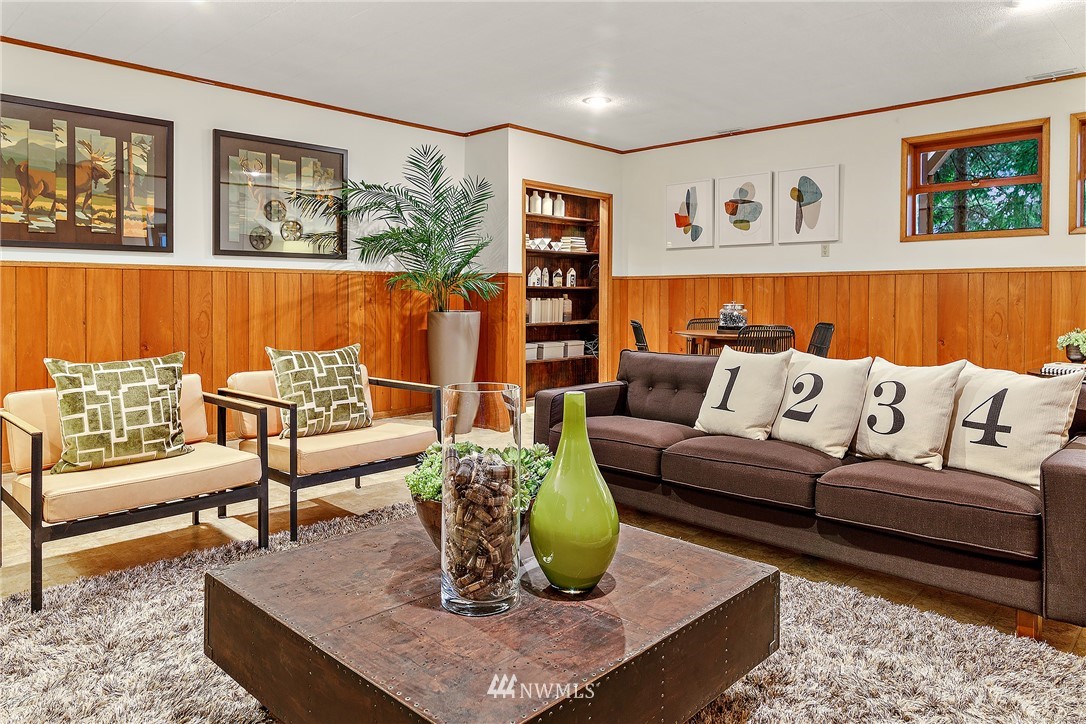 8316 Olympic View Drive Edmonds, WA 98026 - Photo 25 of 38 a living room with furniture and painting on the wall