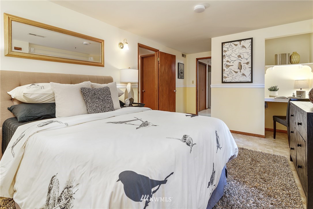 8316 Olympic View Drive Edmonds, WA 98026 - Photo 29 of 38 a bedroom with a bed and painting on the wall