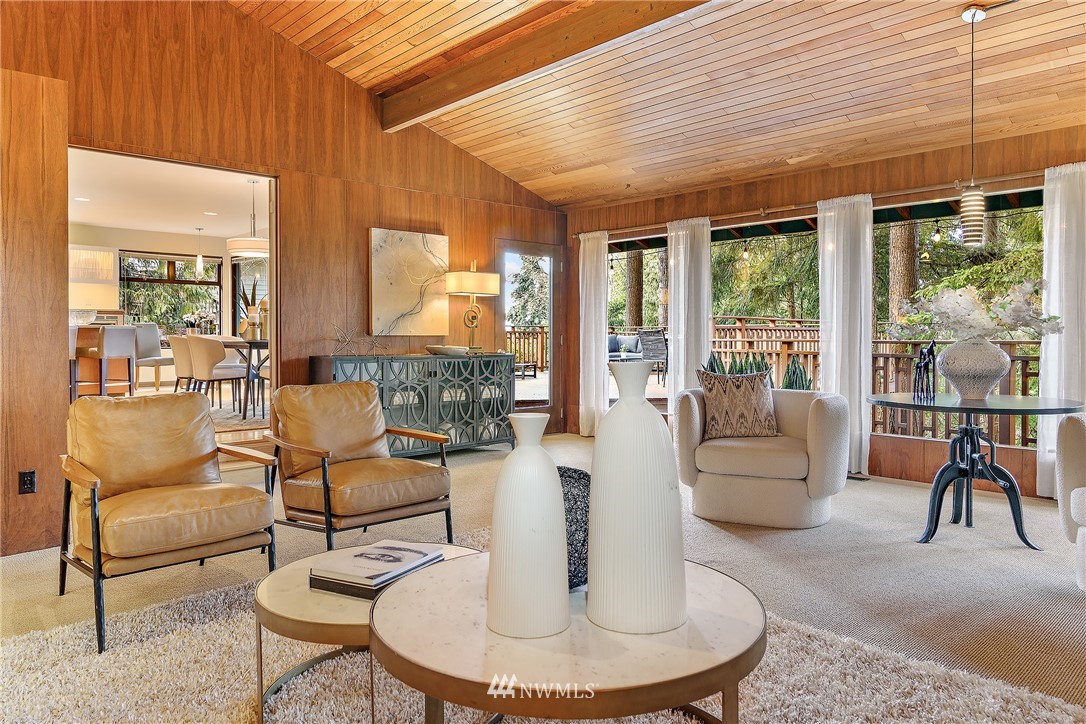 8316 Olympic View Drive Edmonds, WA 98026 - Photo 6 of 38 a living room with couches chairs and a dining table with garden view
