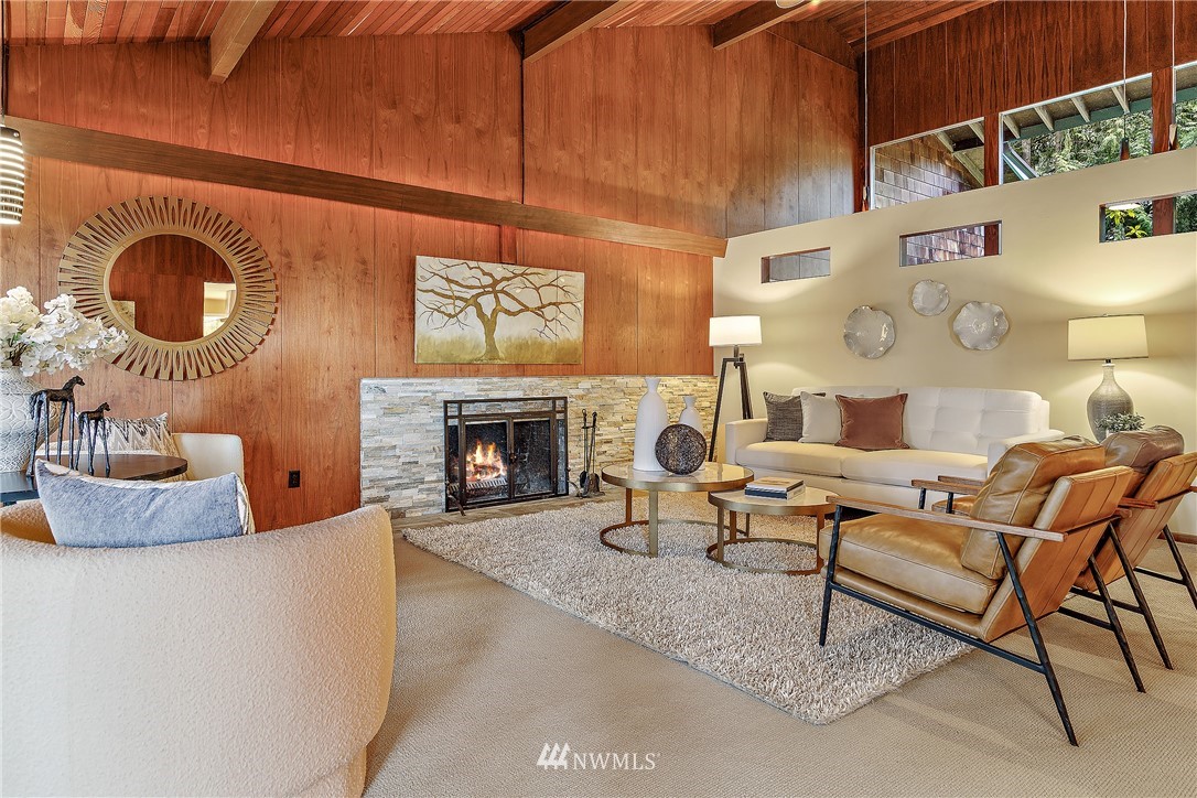 8316 Olympic View Drive Edmonds, WA 98026 - Photo 8 of 38 a living room with furniture and a fireplace