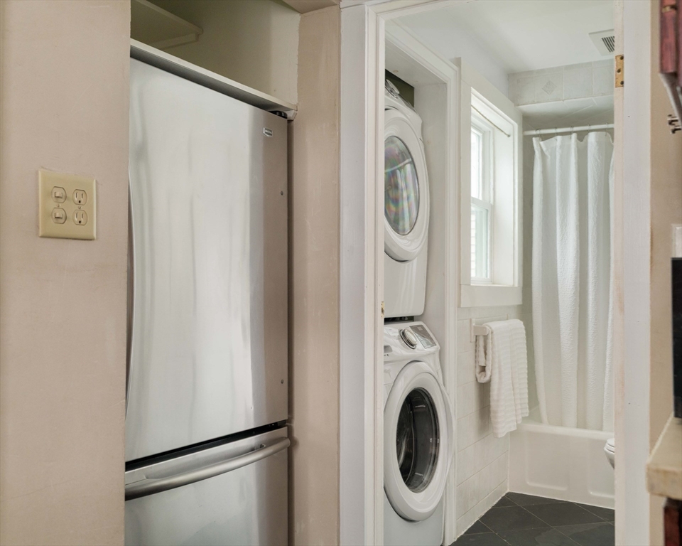 277 Lamartine Street Boston, MA 02130 - Photo 15 of 28 a utility room with dryer and washer