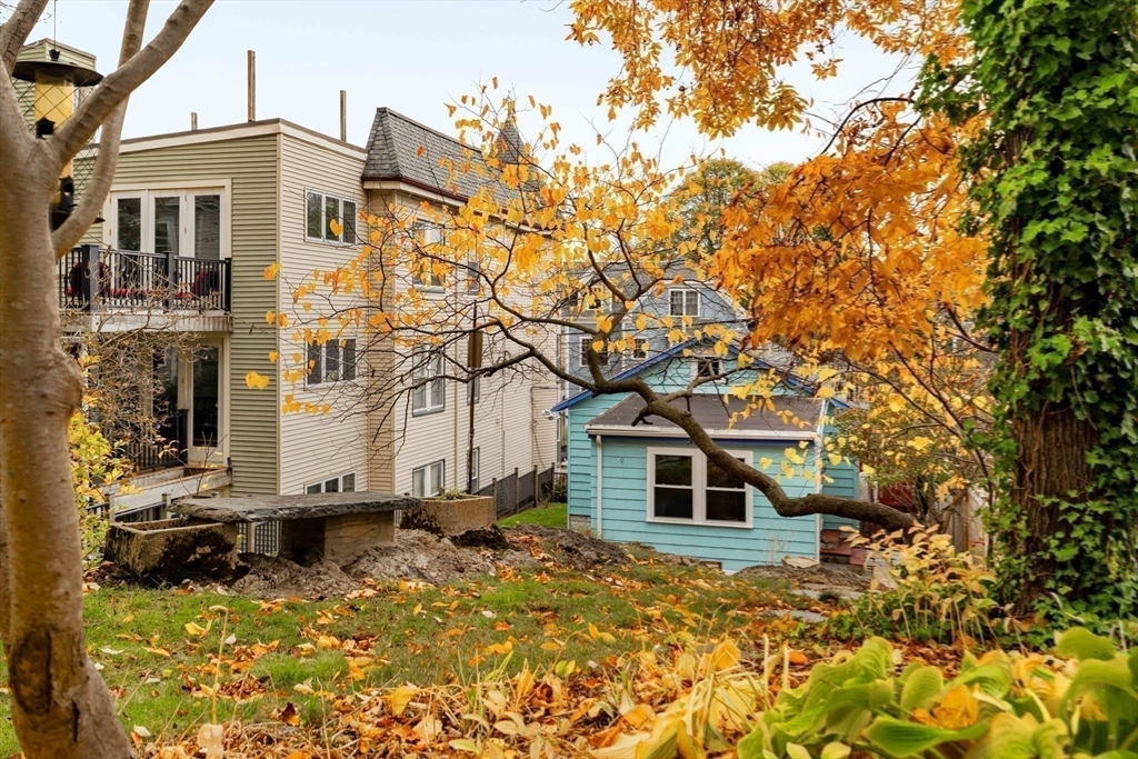 277 Lamartine Street Boston, MA 02130 - Photo 24 of 28 a front view of a house with a yard