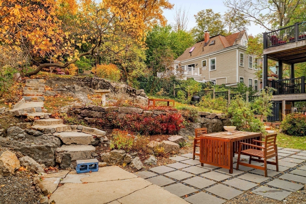 277 Lamartine Street Boston, MA 02130 - Photo 25 of 28 a view of a chairs and table in a backyard