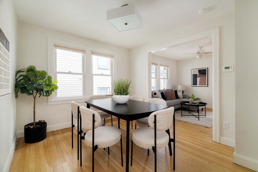 277 Lamartine Street Boston, MA 02130 - Photo 8 of 28 a view of a dining room with furniture and wooden floor