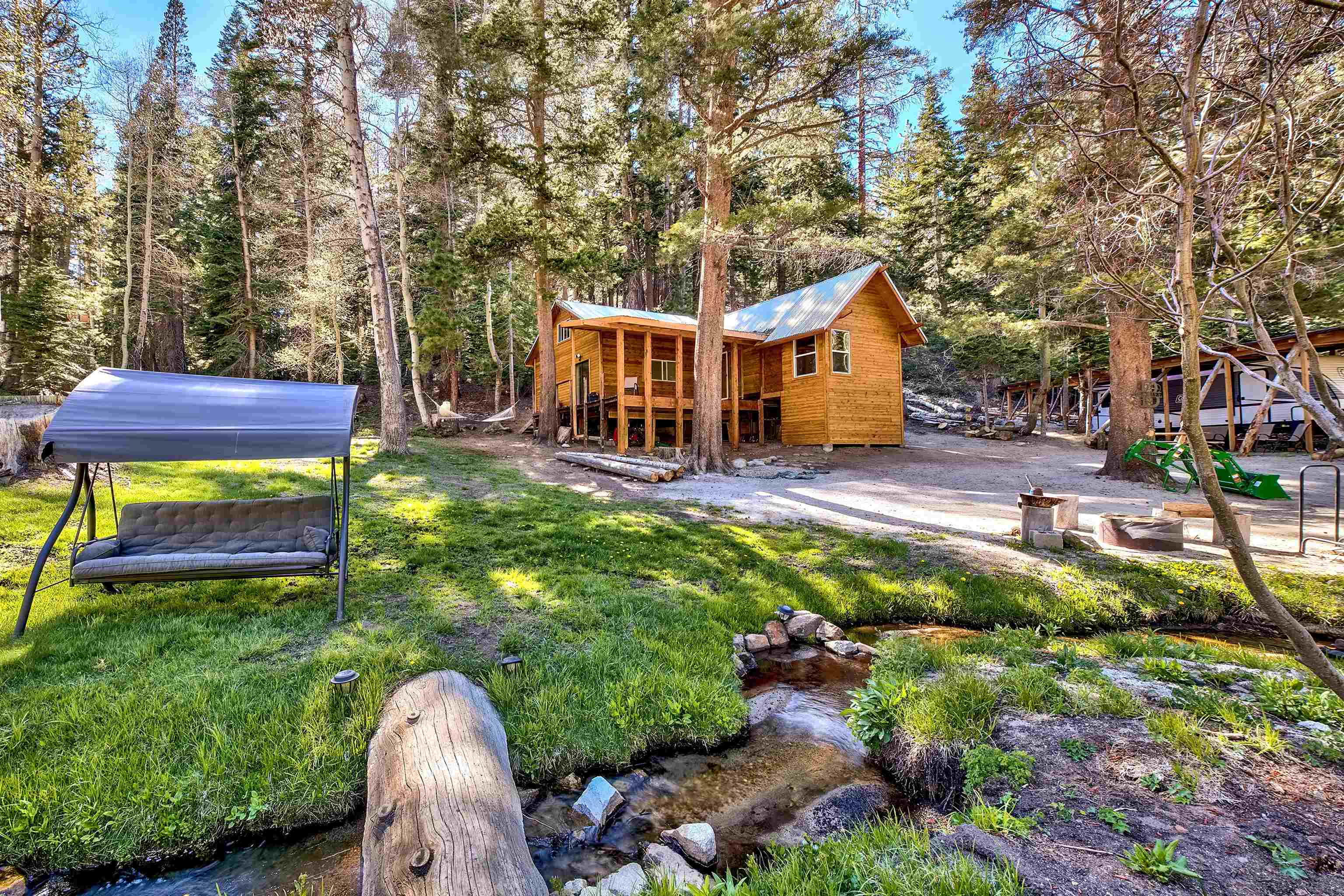 12065 Bums Gulch Road Reno, NV 89511 - Photo 3 of 21 a view of a house with a yard porch and sitting area
