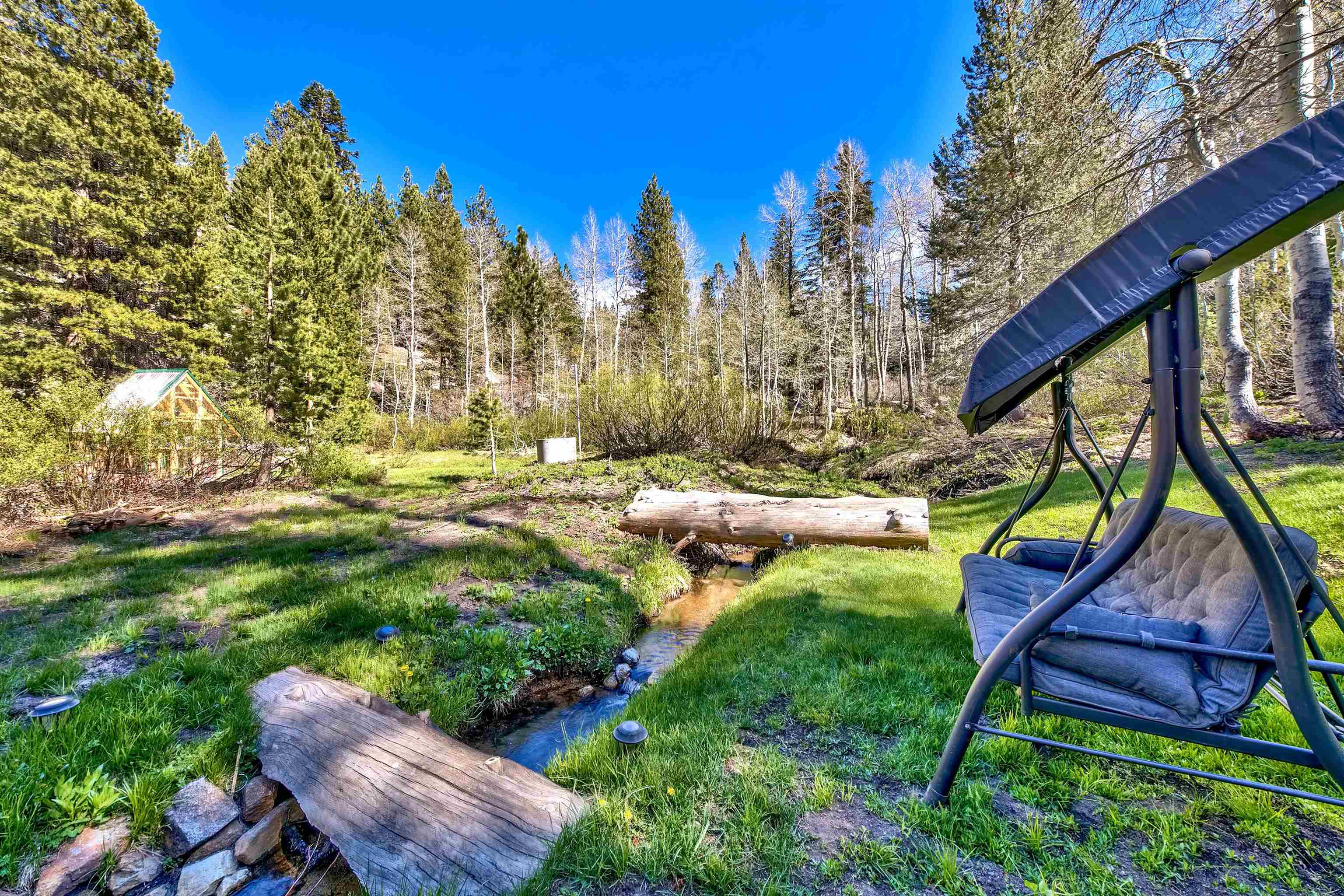 12065 Bums Gulch Road Reno, NV 89511 - Photo 5 of 21 a backyard of a house with table and chairs