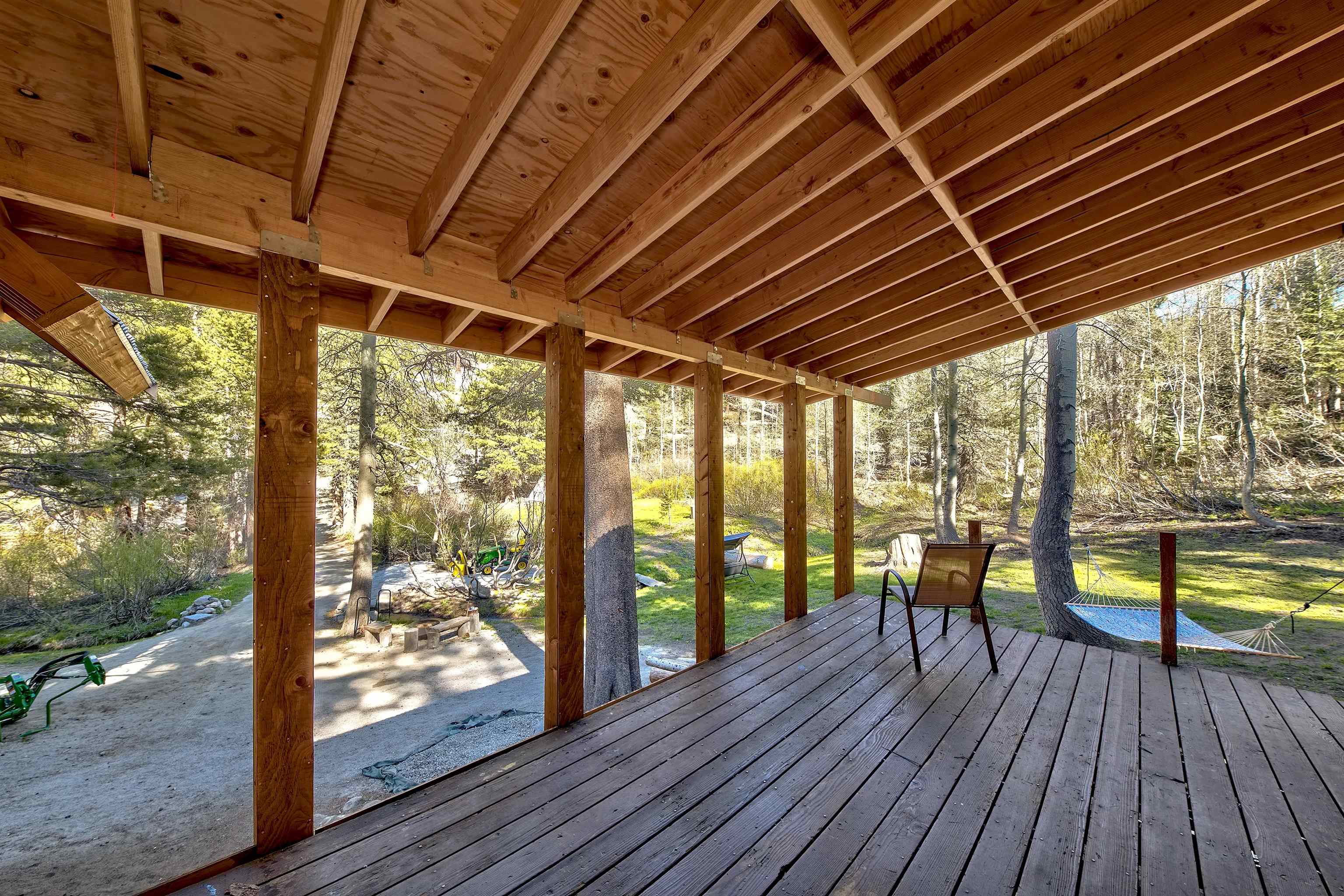 12065 Bums Gulch Road Reno, NV 89511 - Photo 7 of 21 a view of a porch with wooden floor