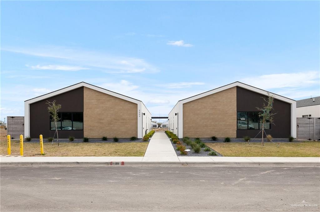 2609 Woodpecker Road, Unit 1 Weslaco, TX 78596 - Photo 1 of 18 a view of a house with a outdoor space