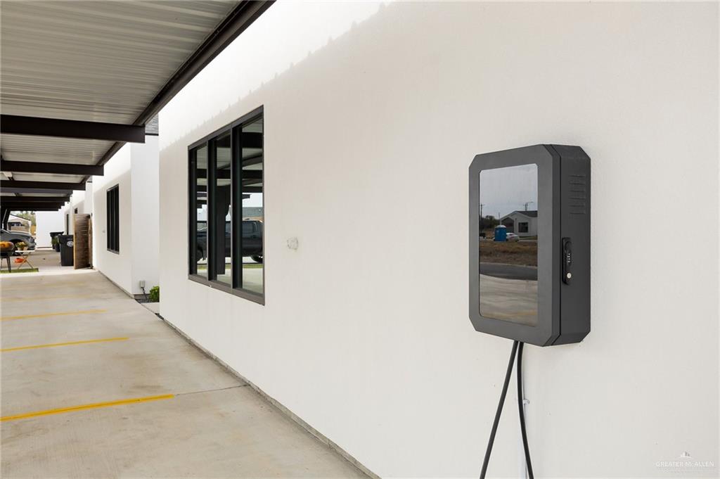 2609 Woodpecker Road, Unit 1 Weslaco, TX 78596 - Photo 15 of 18 a room with a window and a chandelier