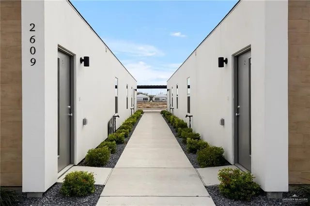 a view of a house with pathway