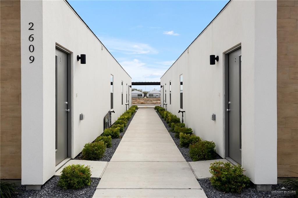 2609 Woodpecker Road, Unit 1 Weslaco, TX 78596 - Photo 4 of 18 a view of a house with pathway