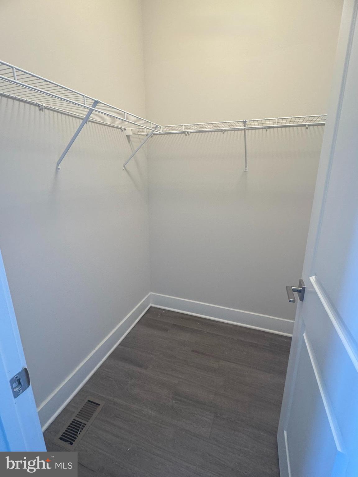 2921 Osprey Way Frederick, MD 21701 - Photo 14 of 27 a view of a room with racks on the wall