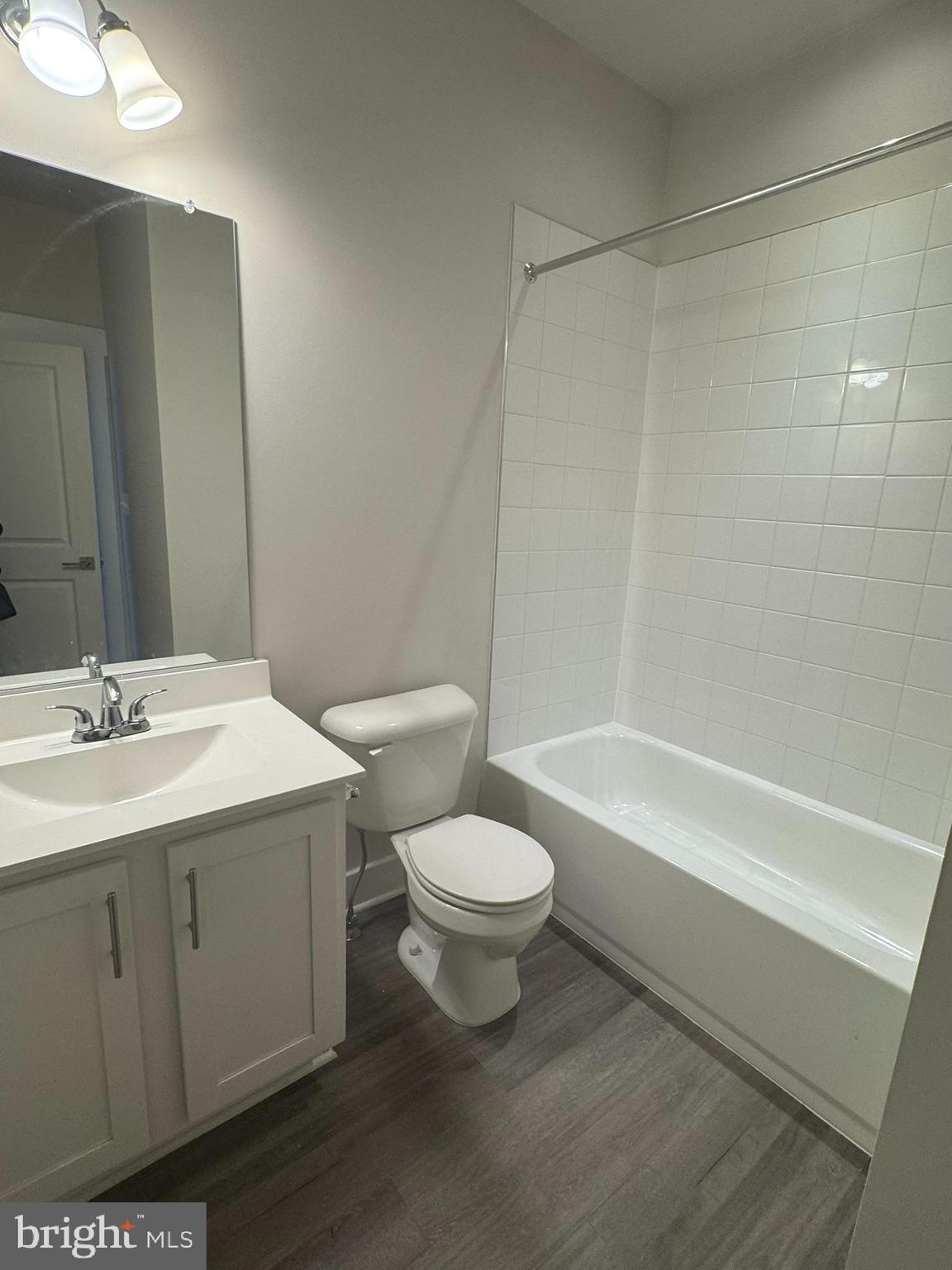 2921 Osprey Way Frederick, MD 21701 - Photo 16 of 27 a bathroom with a sink a toilet and shower