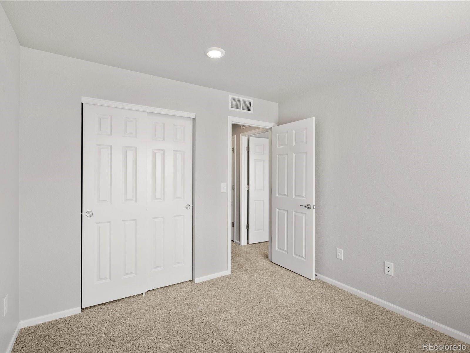 14451 Pansy Loop Morrison, CO 80465 - Photo 28 of 34 an empty room with closet area